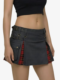 Black and red plaid skirt worn by a person on a white background