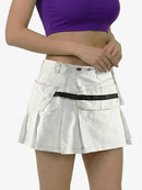 White skirt with black belt worn by a person on a white background