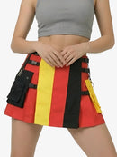 Person wearing a red, yellow, and black striped skirt with tool belt design on a white background