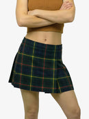 Person wearing a plaid skirt on a white background