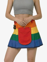 Person wearing a rainbow-colored skirt with a red pocket on a white background