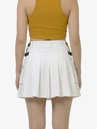 White pleated skirt worn by a person on a white background